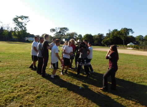 Junior Serena Halajian works with the boys .